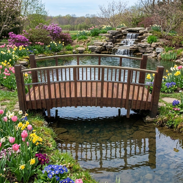 Japanese Bridge with Split Railings 12 ft Taiko spans a small pond with waterfalls in a sunny spring garden